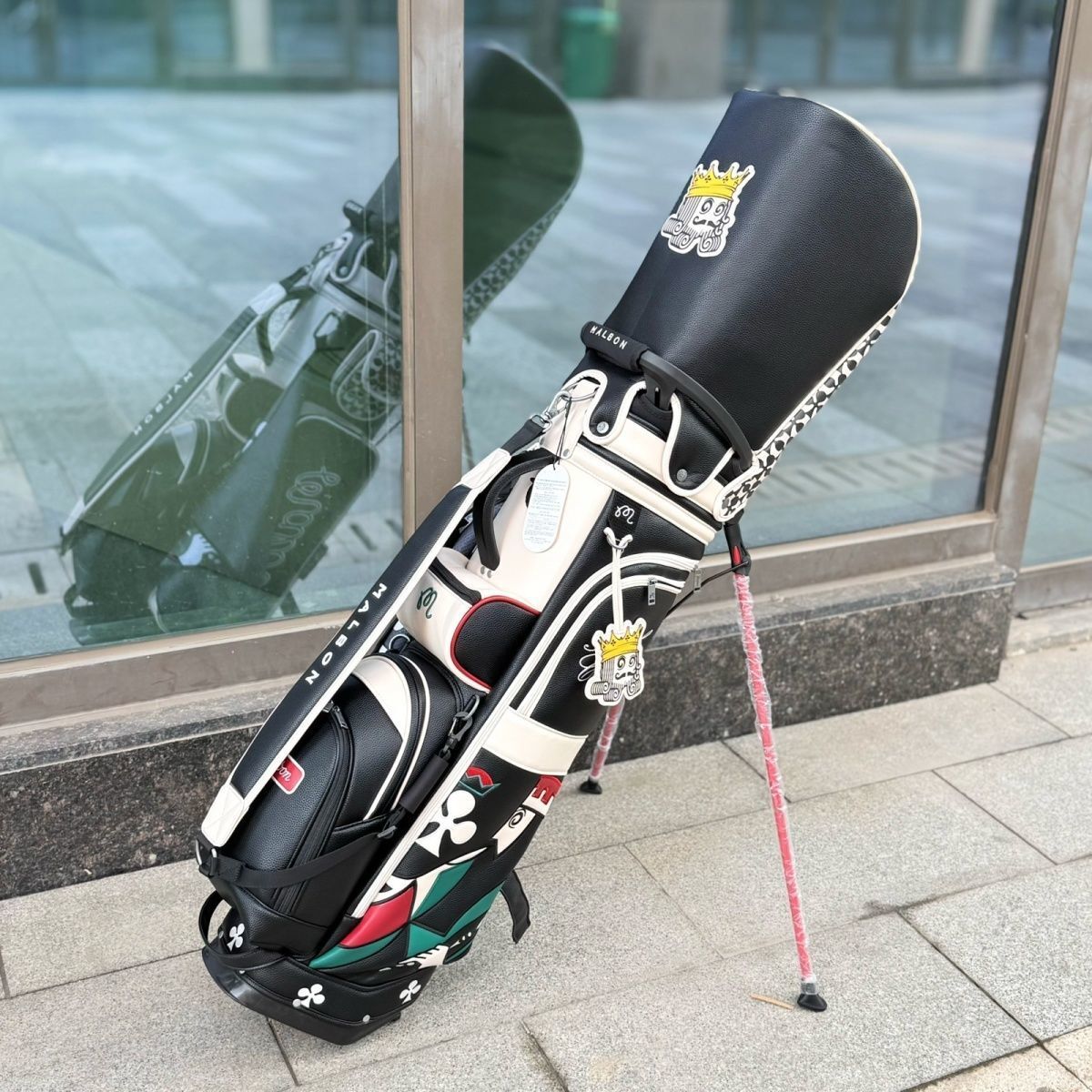 Malbon Bag 86 - Golf Master
✔️ Brand New Premium Clubs
✔️ FREE Custom Fitting (Shaft & Grip)
✔️ Tour-Level Performance
✔️ Worldwide FREE Shipping 
✔️Indistinguishable from the authetic.
 ✅What you see is what you get.✅
🏌️‍♂️ **Premium Golf Products** 🏌️‍♀️
Irons | Drivers | Putters | Wedges | Bags