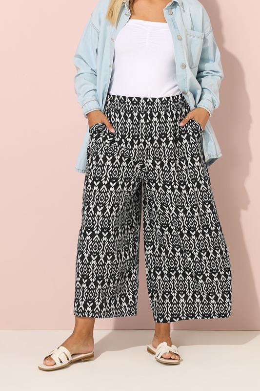 Yours YOURS Curve Black Ikat Print Wide Leg Trousers