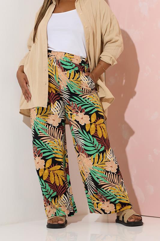 Yours YOURS Curve Black Tropical Print Wide Leg Trousers
