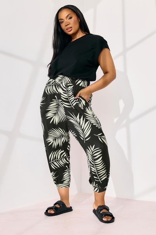 Yours YOURS Curve Black Palm Leaf Cropped Harem Trousers