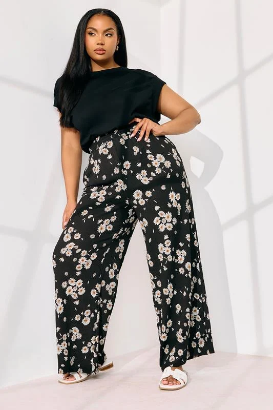 Yours YOURS Curve Black Daisy Print Wide Leg Trousers