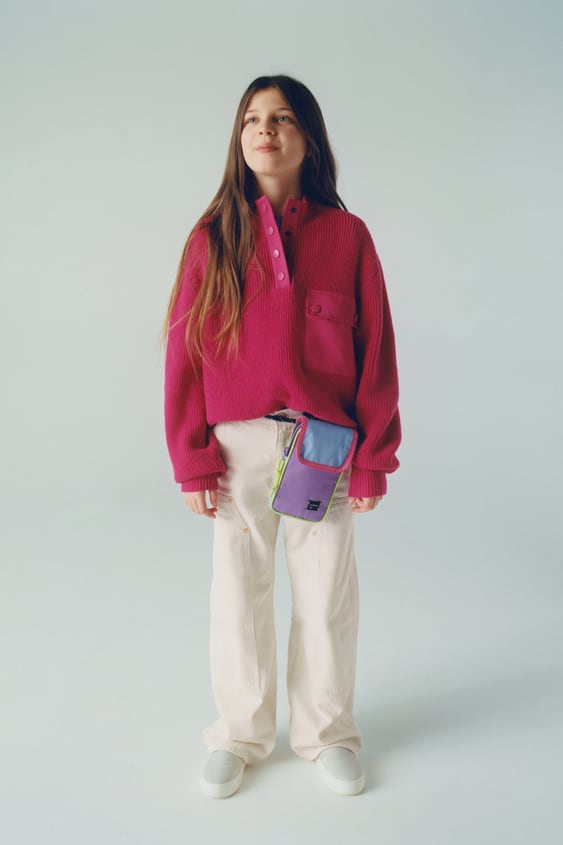 KNIT SWEATER WITH FLAPS