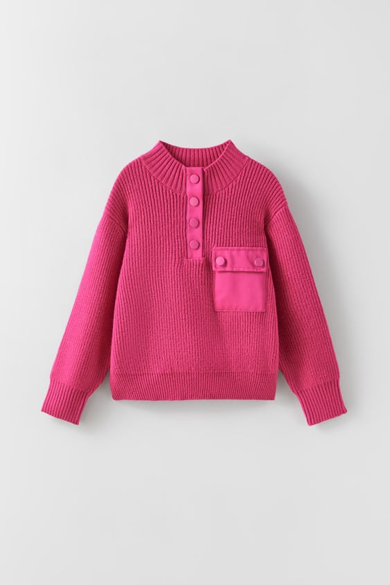 KNIT SWEATER WITH FLAPS