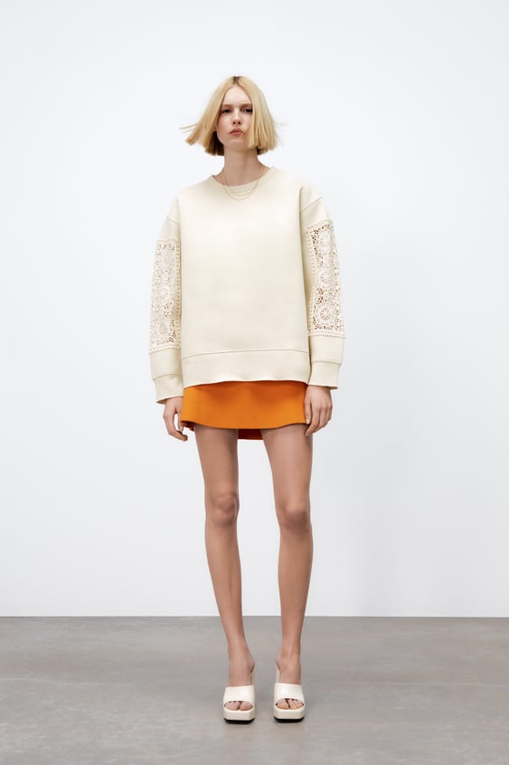 EMBROIDERED EYELET SWEATSHIRT