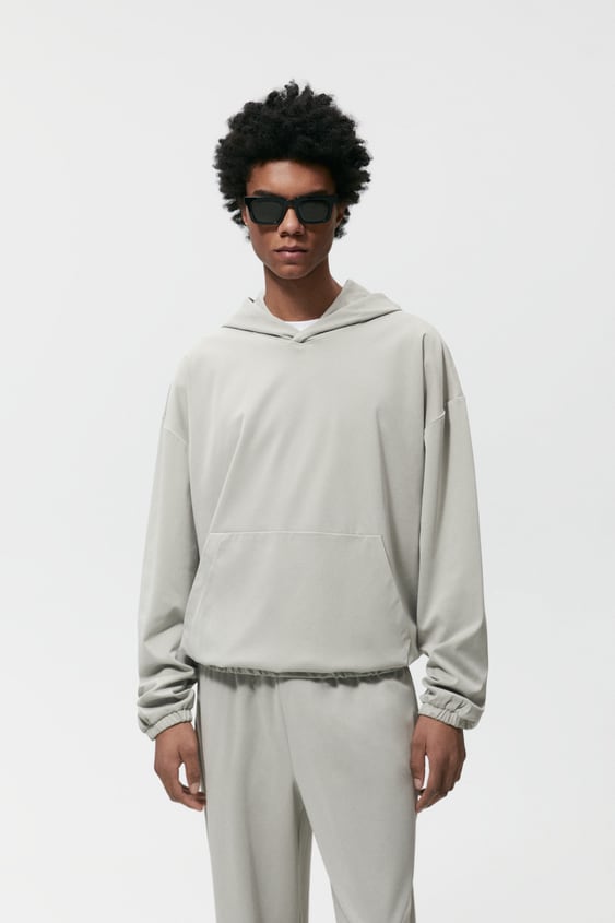 HOODED TECHNICAL SWEATSHIRT