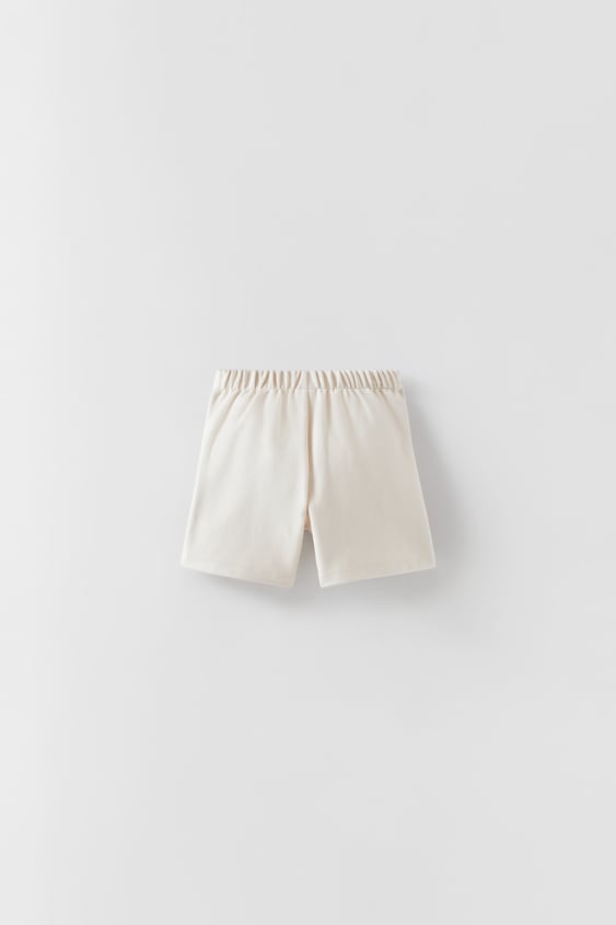GOLD BUTTON SHORTS