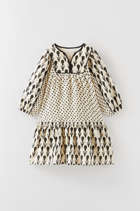 COMBINATION DRESS WITH PIPING