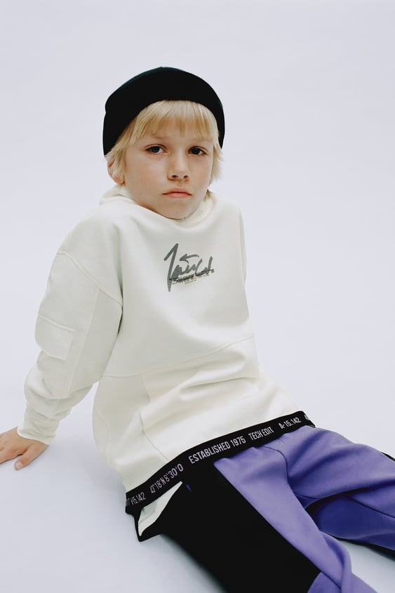 ATHLETIC SNAP BUTTON SWEATSHIRT
