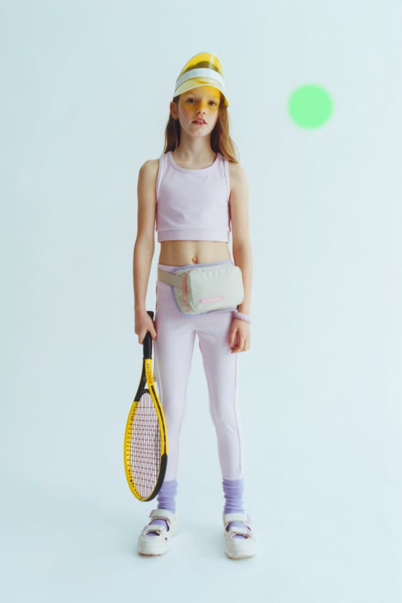 PIPED SPORTY TOP