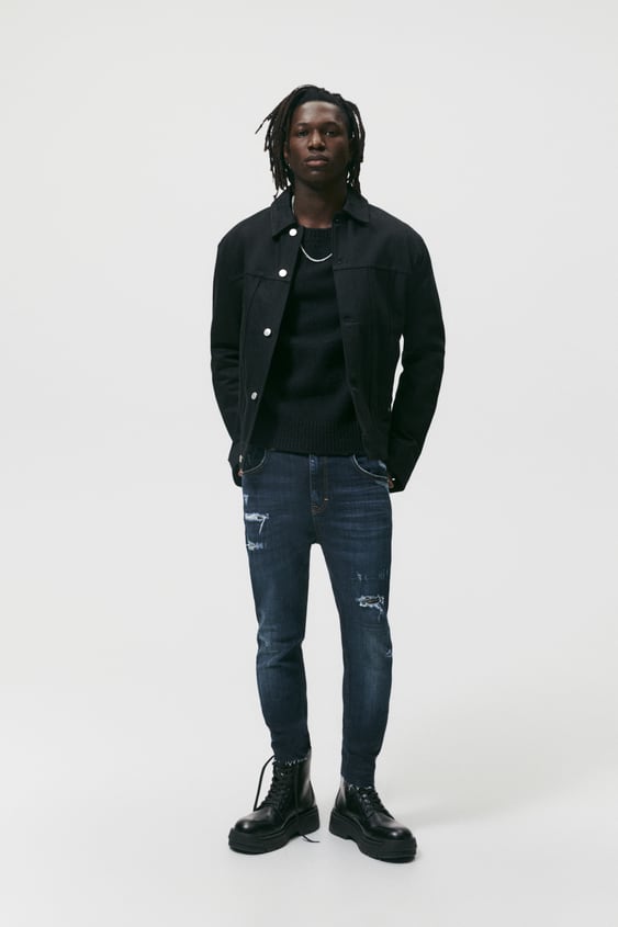 TAPERED RIPPED JEANS