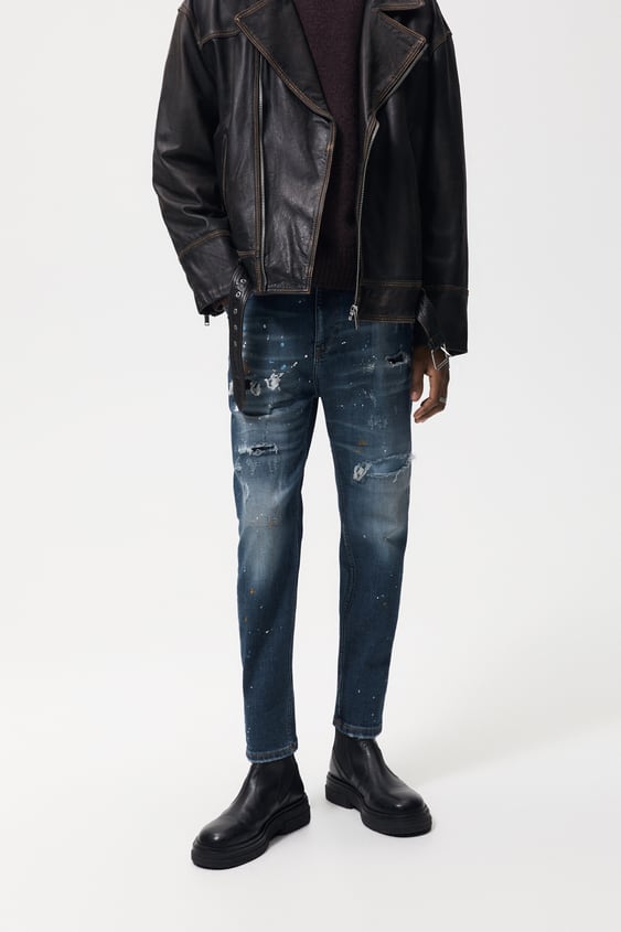 SPLATTERED SKINNY JEANS