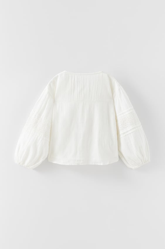 BLOUSE WITH SWISS EMBROIDERY