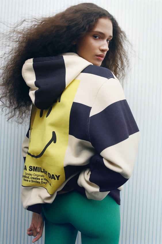 STRIPED SMILEY SWEATSHIRT