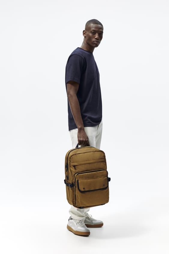 MULTI-FUNCTIONAL FABRIC BACKPACK