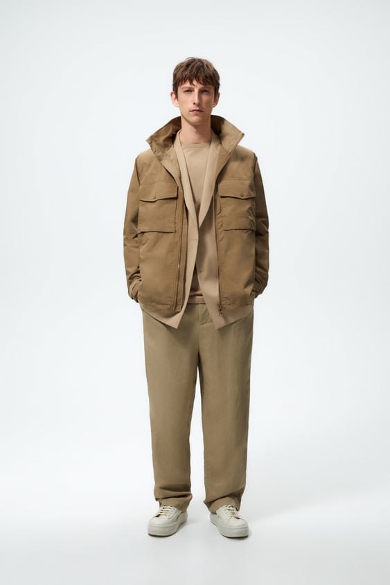 TECHNICAL JACKET WITH POCKETS