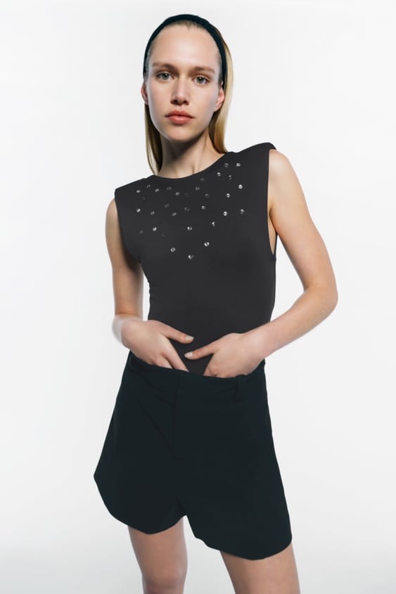 SPARKLY BODYSUIT WITH SHOULDER PADS
