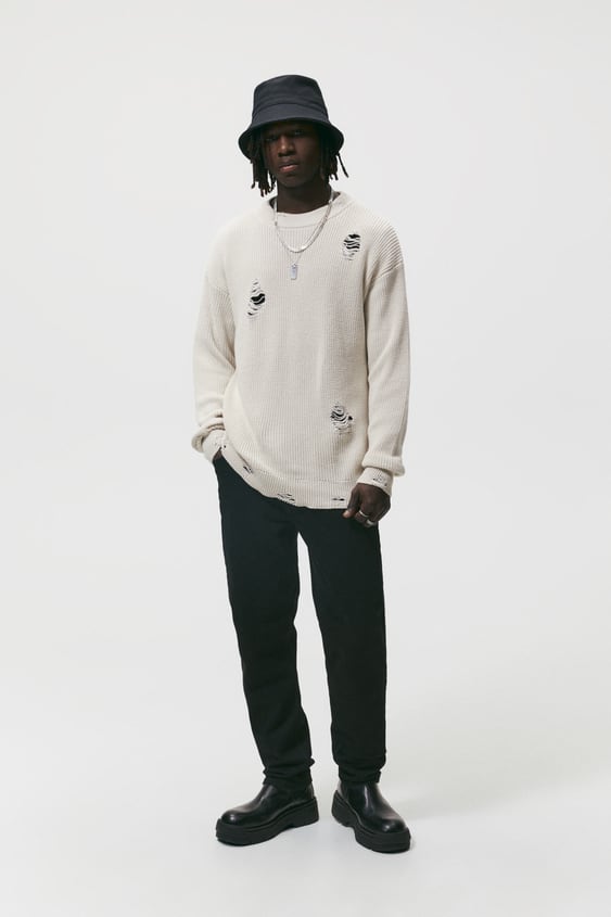 RIPPED SWEATER