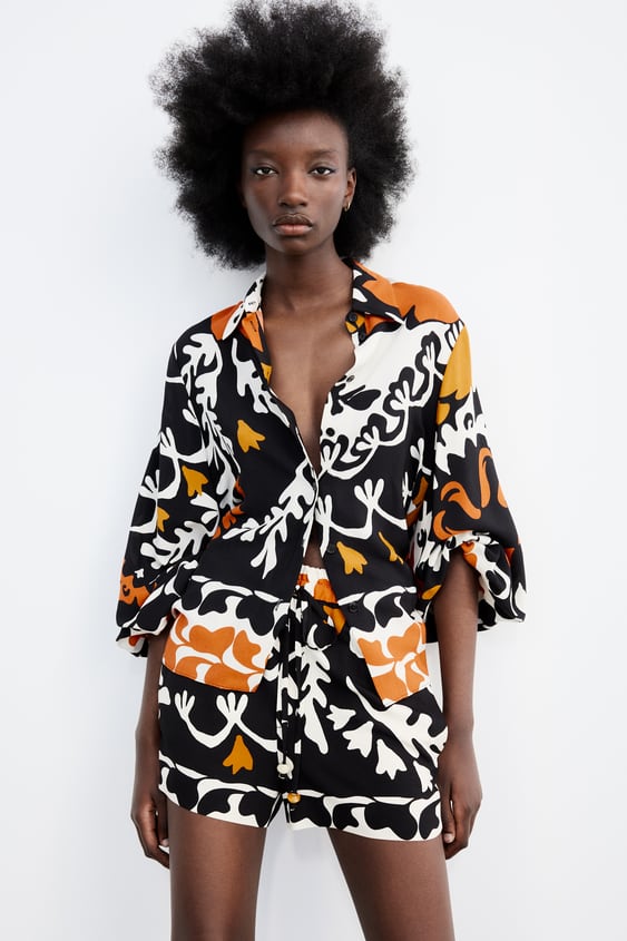 PRINTED VOLUMINOUS SLEEVE BLOUSE