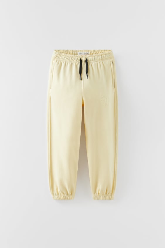 EMBROIDERED PLUSH PANTS