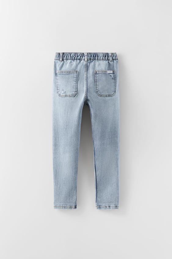DESTROYED JOGGER JEANS